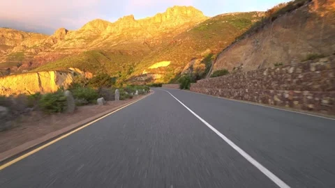 Driving empty Chapman's peak drive on a sunset. 스톡 동영상 253776585