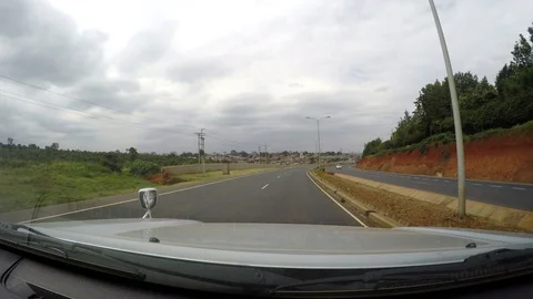 Driving on empty road in Africa Video stock 107193712