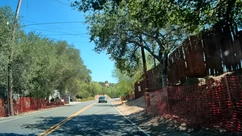 Driving on an empty road along a residential street, Los Angeles Stock Footage 343475844