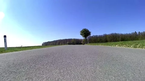 Driving on an empty road in the austrian region weinviertel in spring Stock Footage 132086690