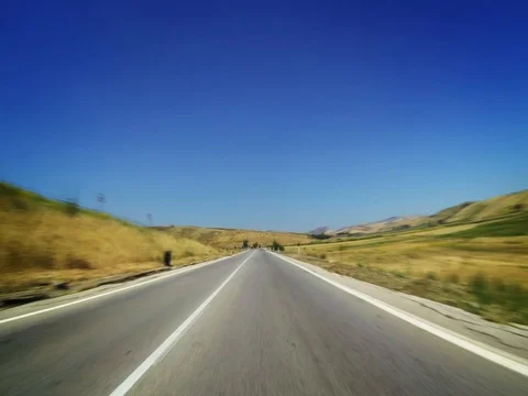 Driving on the empty road Stock Footage 77298996
