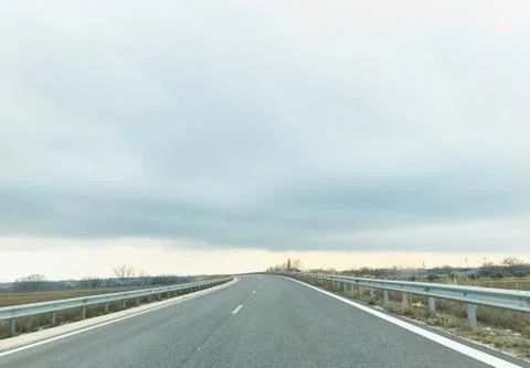 Driving on an empty road 写真素材