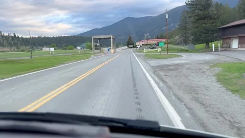 Driving from Eureka, MT USA to the Canadian border early in the morning Stock Footage 334569484