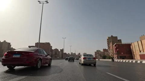 Driving the Expansive Cairo Ring Road Network Through the Heart of Greater Cairo Stock Footage 329829388