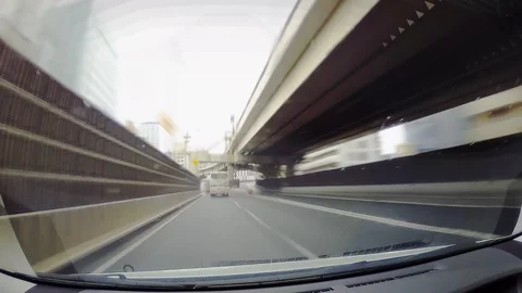 Driving on an expressway in Tokyo while light rain pouring down Video stock 99138444