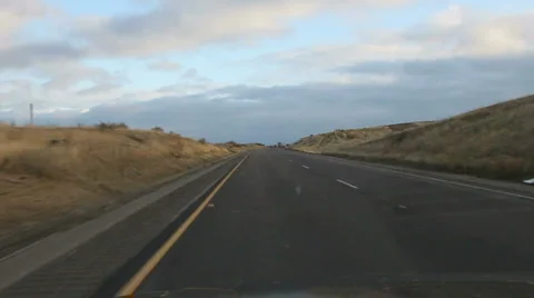 Driving Fast Between Rocky Landscape Stock Footage 5760337