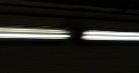 Driving Fast Pass Lights Through Underground Tunnel, 4K Stock-Footage 68920840