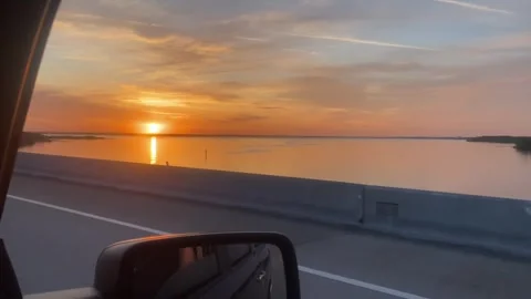 Driving Florida Sunset on Coast Stock Footage 258358414