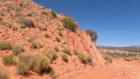 Driving following mountain red sandy desert trail Utah POV 4K Stock Footage 307740740