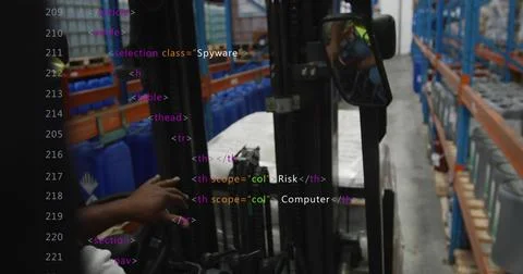 Driving forklift driver steering controls in warehouse aisle, showing safety Stock Photos