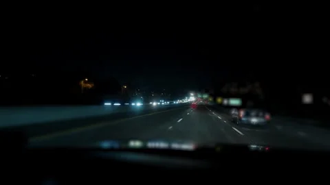 Driving the freeway at night with shift and tilt camera lens effect Stock Footage 292661127