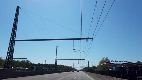 Driving on german e Highway A5 - Interstate with electric overhead wire POV Stock Footage 146491250