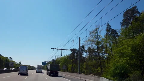 Driving on german eHighway - Interstate with electric overhead wire POV Stock Footage 146491252
