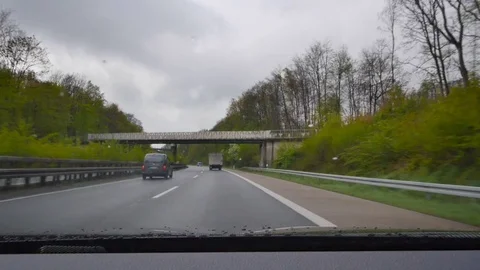 Driving on a German highway in rain Stock Footage 75070671