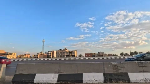 Driving the Giant Cairo Ring Road Loop with Wide Views of the Capital Landscape Stock Footage 330077701