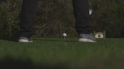 Driving a Golf Ball off of a Tee Video stock 141079269