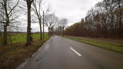Driving golf cart in fields of Belgium, front view Vídeo Stock 331224686