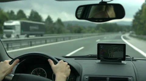Driving with GPS device on the dashboard Stock Footage 33064045