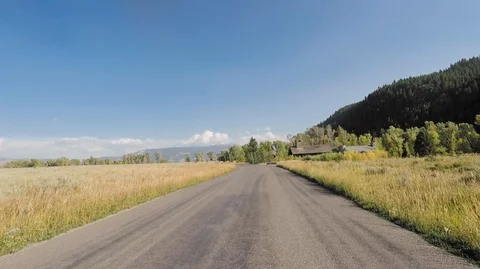 Driving in Grand Teton, Wyoming turning at Intersection 2.7k Ultra HD Stock Footage