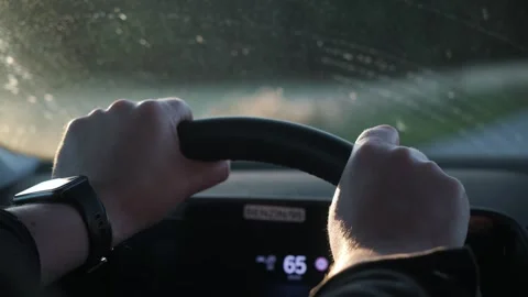 Driving with Hands on the Steering Wheel while observing the Digital Dash Video stock 318146070