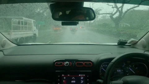 Driving In Heavy Rain In Traffic Vídeo Stock 144596499