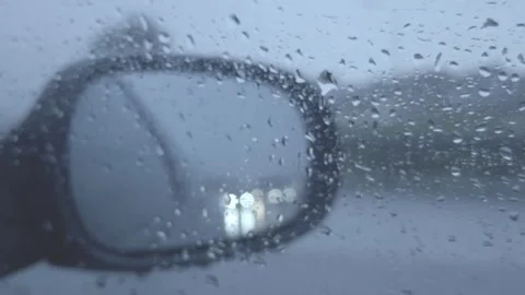 Driving in Heavy Rain with Windshield Wipers Clearing Glass Video stock 327589322