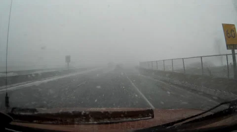 Driving in heavy snow in winter storm on highway v2 Stock Footage 36595959
