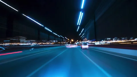 Driving at High Speed Through the Streets. Bright Motion Timelapse of the Night Stock Footage 305372167