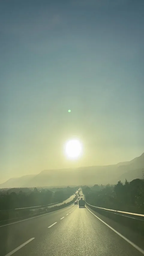 Driving on the highway against the sunset Stock Footage 337129913