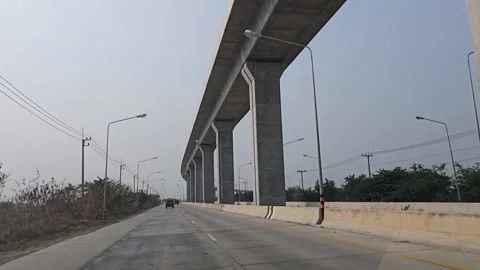 Driving in highway and elevated railway. Stock Footage 340757972