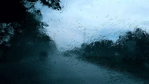 Driving in highway on a cloudy day during day timeDriving in highway in rains Stock Footage 113288704