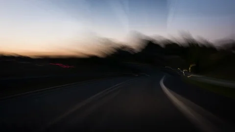 Driving on a highway at dusk Stock-Footage 91868068