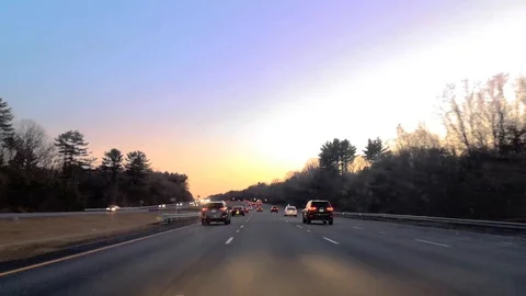 Driving on the highway at dusk Stock Footage 129574193