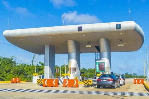 Driving on highway freeway motorway thru toll booth house Mexico. Quintana... 스톡 사진