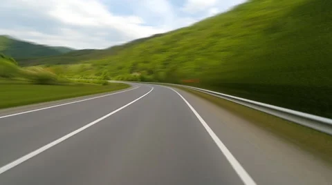 Driving on the highway in the mountains. Stock Footage 67973997
