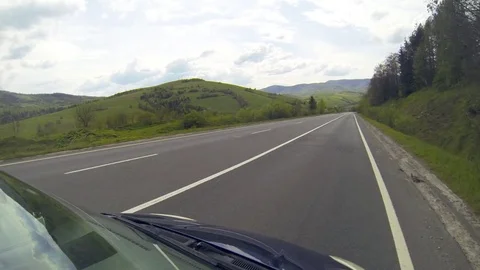 Driving on the highway in the mountains. Stock Footage 70210823