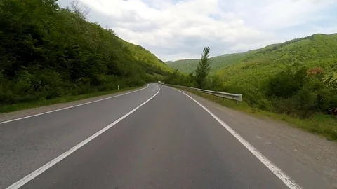 Driving on the highway in the mountains. Stock Footage 70382449