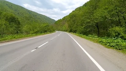 Driving on the highway in the mountains. Stock Footage 70388322
