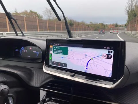 Driving on highway with navigation system showing speed and route to Ljubljan Stock Photos