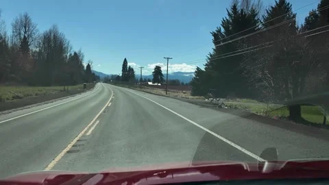 Driving Highway OR 35 outside Hood River in Oregon, USA, with Mount Hood visible Stock Footage 330924924