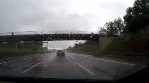 Driving a highway in the rain Stock Footage 172064038