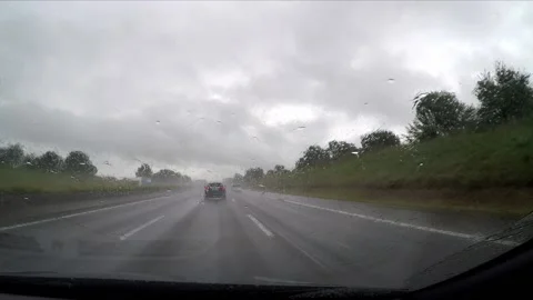 Driving a highway in the rain Stock Footage 172064152
