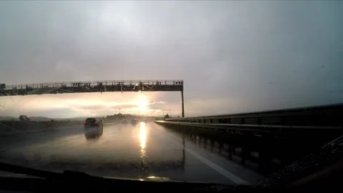Driving a highway in the rain Stock Footage 172067660
