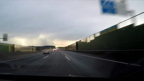 Driving a highway in the rain Stock Footage 172067862
