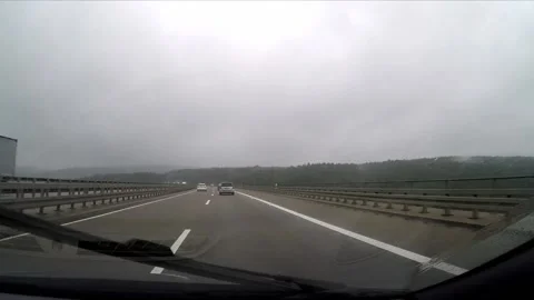 Driving a highway in the rain Stock Footage 172069537