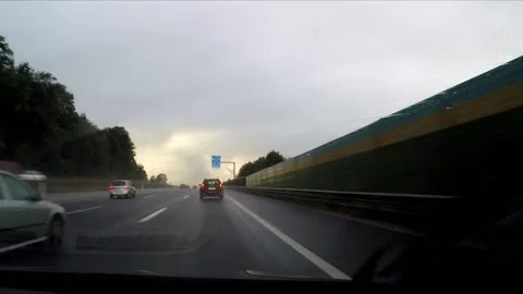 Driving a highway in the rain Stock Footage 172073083