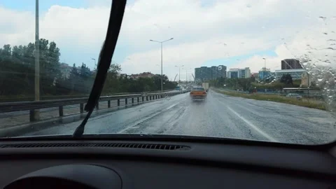 Driving on highway, road. Shooting from inside of car. windshield wipers work Stock Footage 136590610