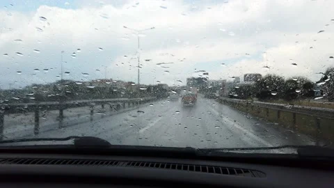 Driving on highway, road. Shooting from inside of car. windshield wipers work Stock Footage 136590613