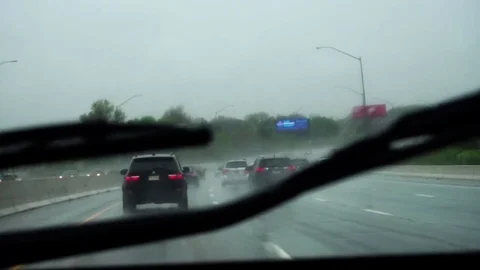 Driving on a highway in a storm Stock Footage 77816393