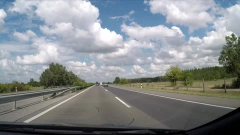 Driving a highway in the sunshine Stock Footage 172063358